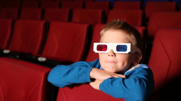 kid watching movie
